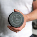 Beard Balm Tin Held by shaving man
